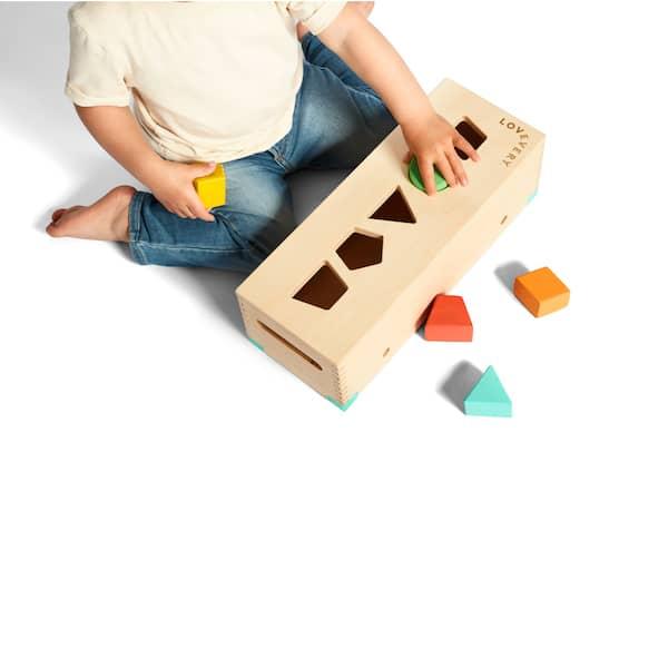 Child playing with Block Set shape sorter image