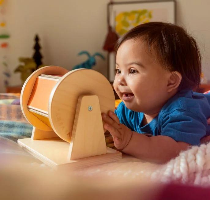 Child Playing with Spinning Rainbow